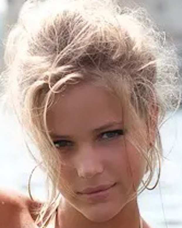 Esti Ginzburg poses in the water off the coast of Naples, Italy.